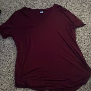 woman’s dark red shirt
